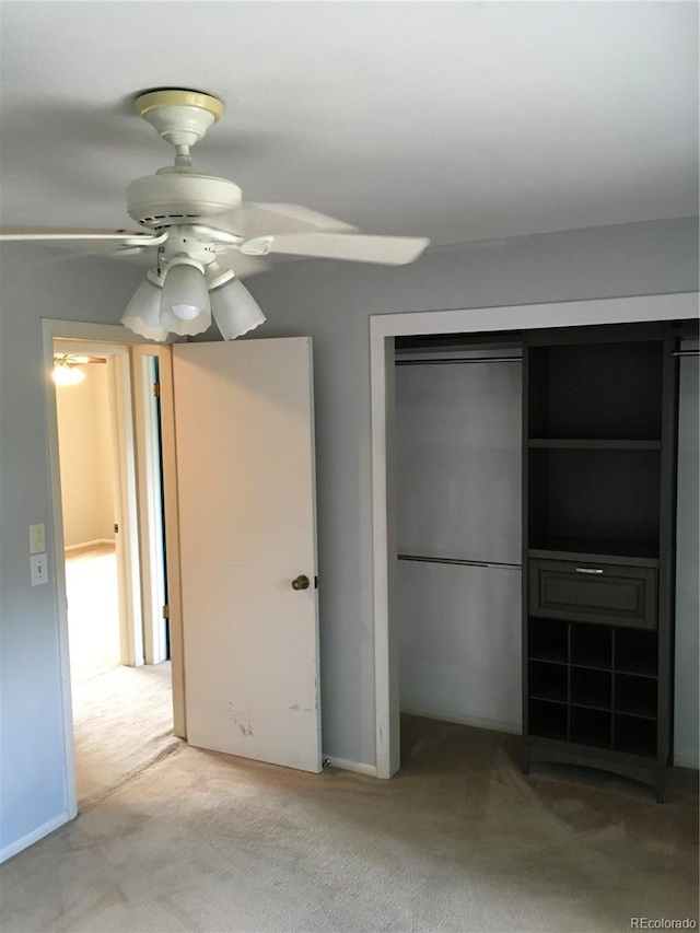 6411 W 82nd Dr, Arvada, CO 80003 - unfurnished bedroom featuring light colored carpet, a closet, and ceiling fan