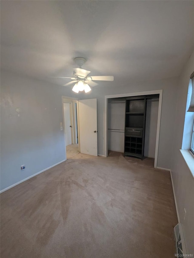 6411 W 82nd Dr, Arvada, CO 80003 - unfurnished bedroom featuring ceiling fan, baseboards, light colored carpet, and a closet