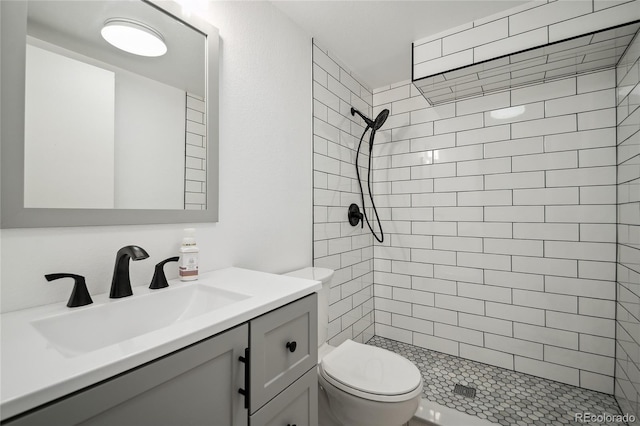6411 W 82nd Dr, Arvada, CO 80003 - bathroom featuring tiled shower and vanity