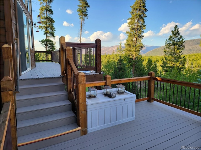 wooden terrace featuring a mountain view