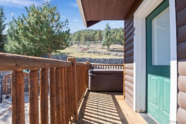 balcony with a hot tub