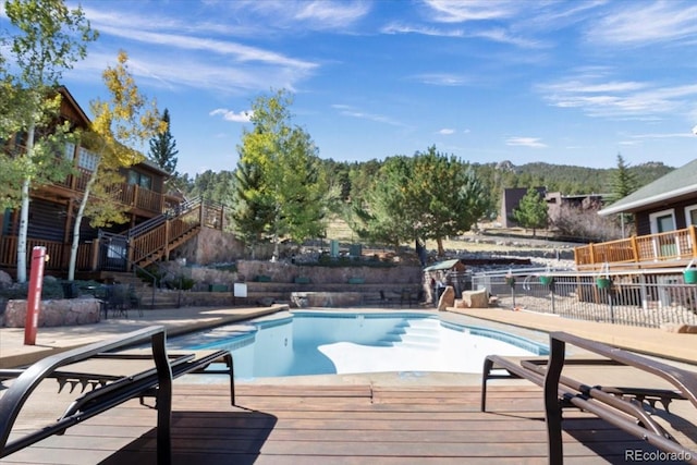 view of pool featuring a deck