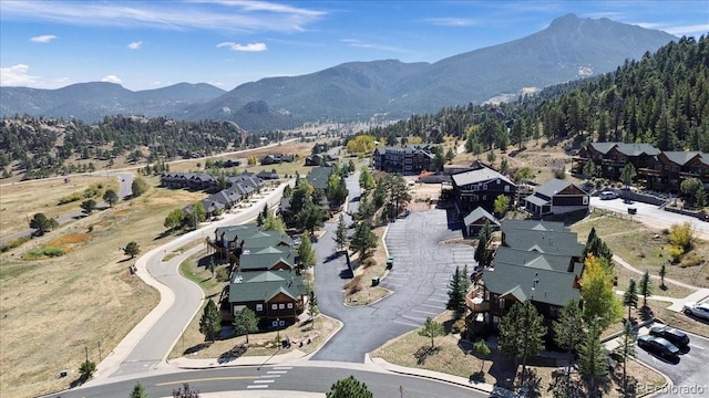 drone / aerial view featuring a mountain view