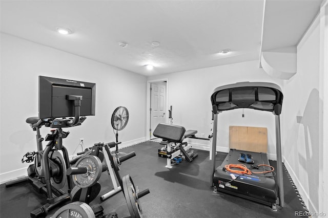 exercise area with baseboards