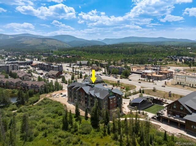 drone / aerial view featuring a mountain view