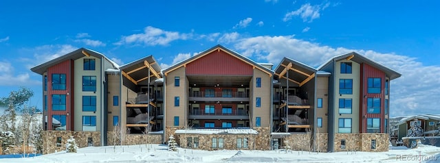 view of snow covered building