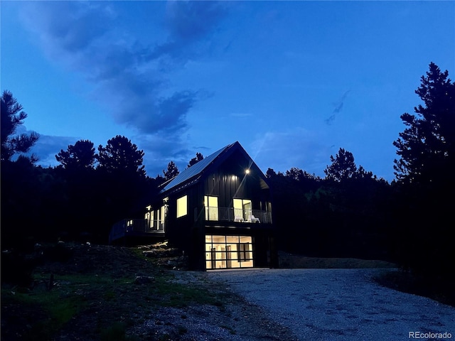 view of property exterior at dusk