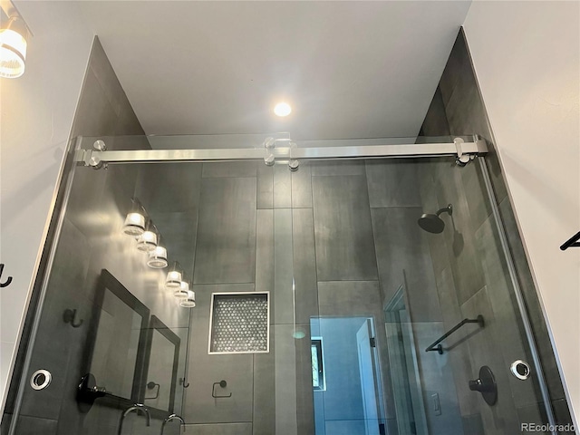 bathroom featuring an enclosed shower