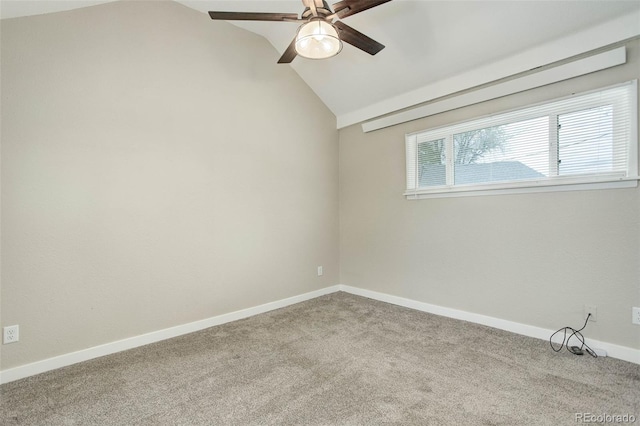 empty room featuring carpet, ceiling fan, and lofted ceiling