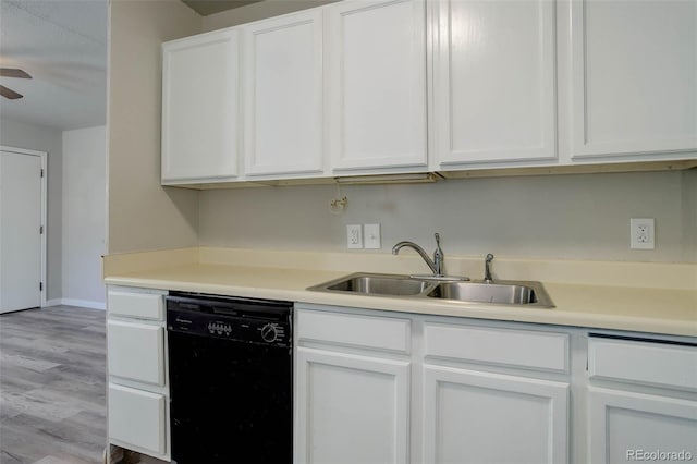 kitchen featuring white cabinetry, black dishwasher, sink, ceiling fan, and light hardwood / wood-style floors