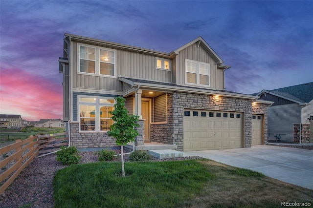 view of front of property with a garage