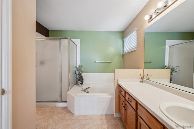 bathroom featuring vanity, shower with separate bathtub, and tile patterned flooring