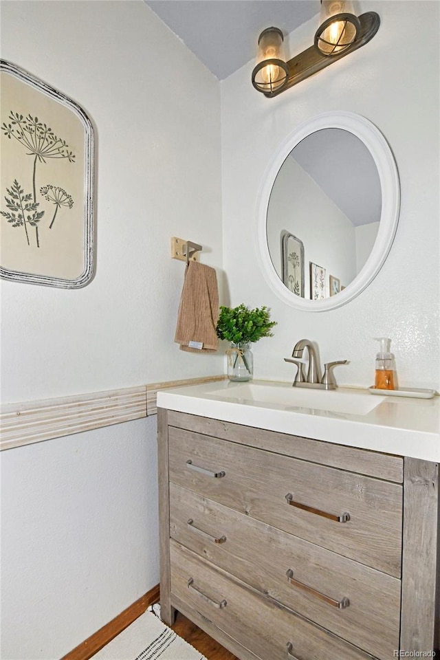 1673 Woodmoor Dr, Monument, CO 80132 - bathroom with vanity and wood finished floors