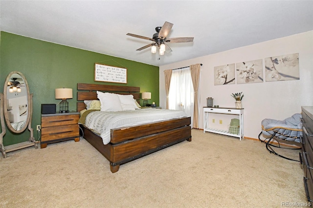 1673 Woodmoor Dr, Monument, CO 80132 - bedroom featuring carpet floors, baseboards, and a ceiling fan