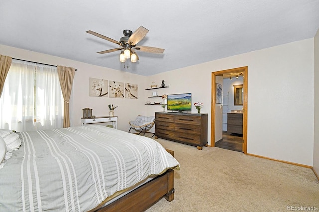 1673 Woodmoor Dr, Monument, CO 80132 - bedroom with carpet flooring, baseboards, ceiling fan, and ensuite bathroom