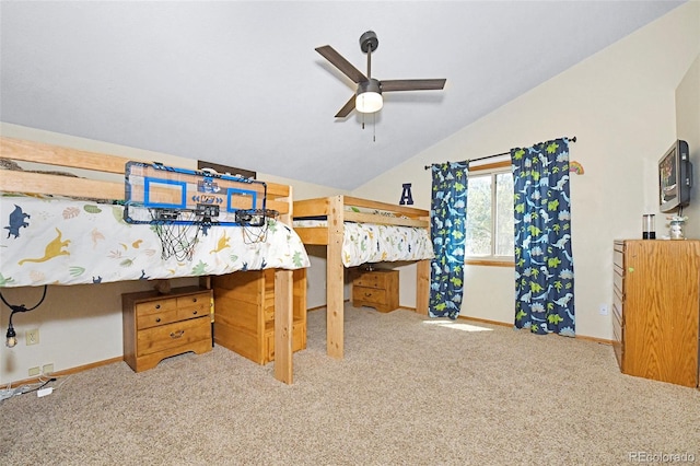 1673 Woodmoor Dr, Monument, CO 80132 - carpeted bedroom with baseboards and vaulted ceiling