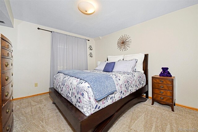 1673 Woodmoor Dr, Monument, CO 80132 - bedroom featuring carpet and baseboards
