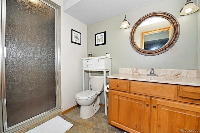 1673 Woodmoor Dr, Monument, CO 80132 - full bath featuring a stall shower, toilet, vanity, and tile patterned flooring