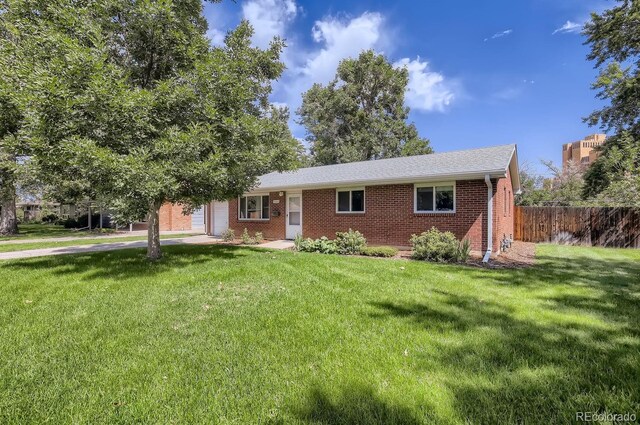 3205 Moorhead Ave, Boulder, CO 80305 - ranch-style house with brick siding, a garage, and concrete driveway