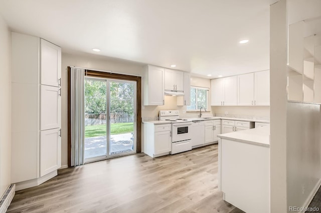 3205 Moorhead Ave, Boulder, CO 80305 - kitchen featuring white appliances, a sink, under cabinet range hood, light wood finished floors, and white cabinets