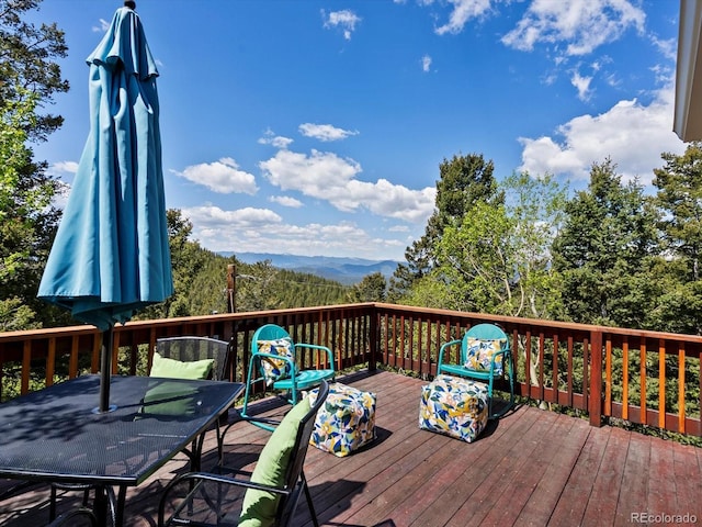 11650 Baca Rd, Conifer, CO 80433 - deck with outdoor dining area
