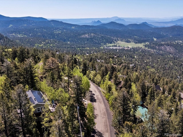 11650 Baca Rd, Conifer, CO 80433 - drone / aerial view of a forest and mountains