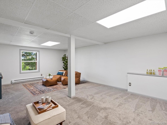 11650 Baca Rd, Conifer, CO 80433 - below grade area with a baseboard radiator, carpet, and a paneled ceiling