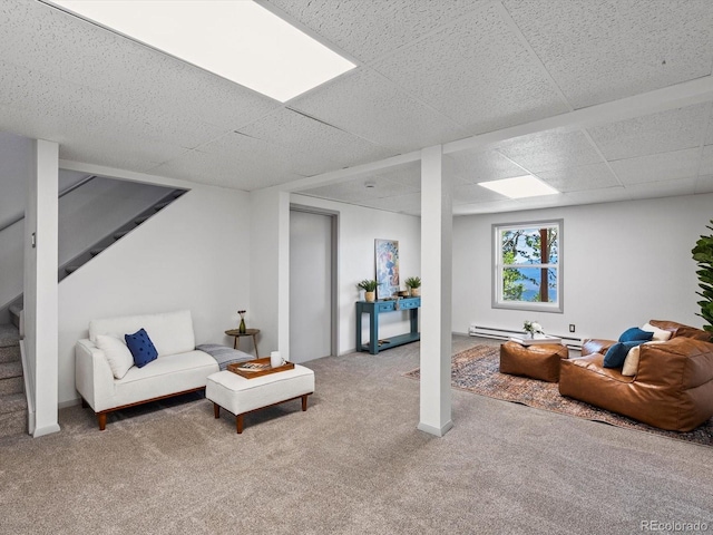 11650 Baca Rd, Conifer, CO 80433 - living room featuring carpet floors, stairway, a paneled ceiling, and a baseboard heating unit