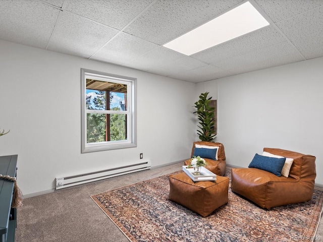 11650 Baca Rd, Conifer, CO 80433 - sitting room featuring a baseboard radiator, a drop ceiling, and carpet flooring