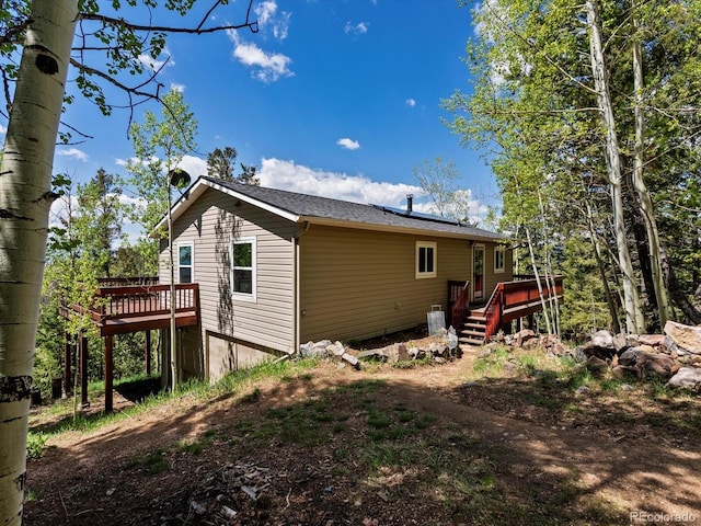 11650 Baca Rd, Conifer, CO 80433 - view of side of property with a deck