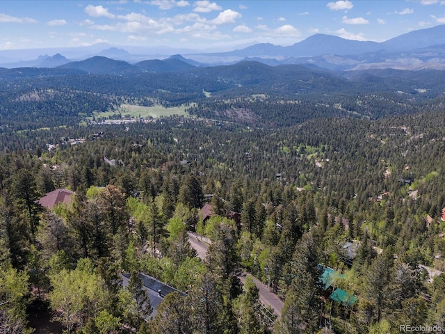 11650 Baca Rd, Conifer, CO 80433 - view of property location featuring a heavily wooded area and a mountain backdrop