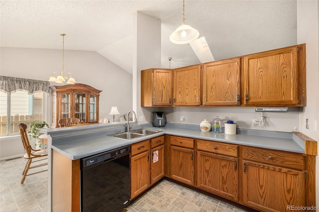 kitchen featuring brown cabinetry, dishwasher, lofted ceiling, and a sink