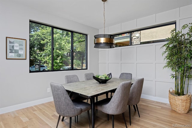 dining space featuring light hardwood / wood-style flooring