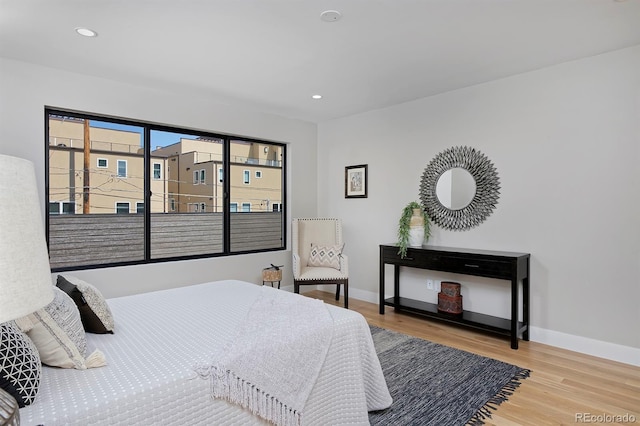 bedroom featuring hardwood / wood-style flooring