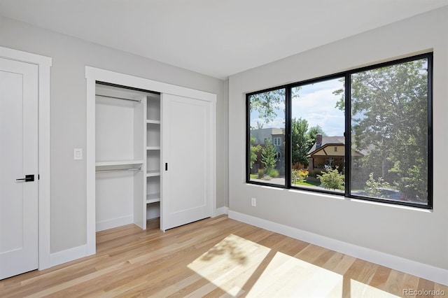 unfurnished bedroom featuring light hardwood / wood-style floors