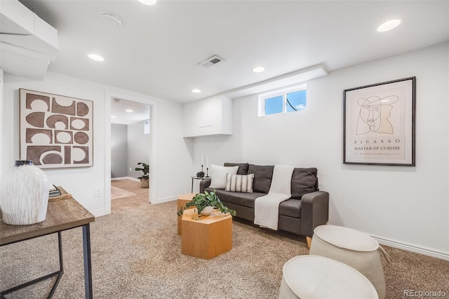 carpeted living room with baseboards, recessed lighting, and visible vents