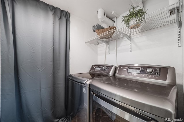 laundry room with laundry area and washer and dryer