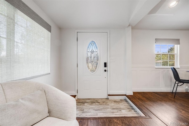 3015 Pierce St, Wheat Ridge, CO 80214 - foyer entrance with wood finished floors and wainscoting