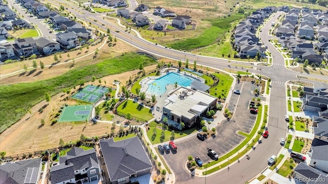 12862 Crane River Dr, Longmont, CO 80504 - aerial overview of property's location featuring a pool area and nearby suburban area