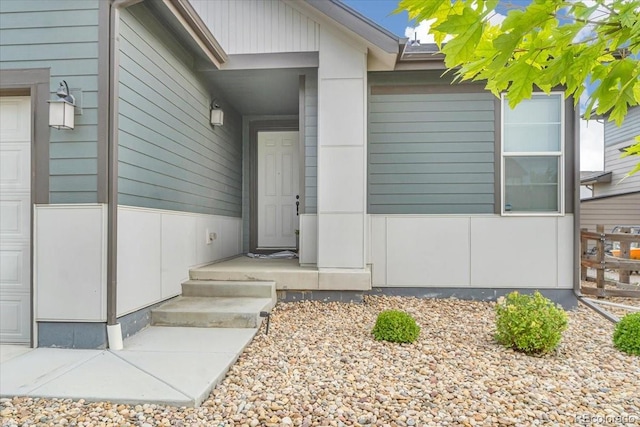 12862 Crane River Dr, Longmont, CO 80504 - doorway to property featuring a garage