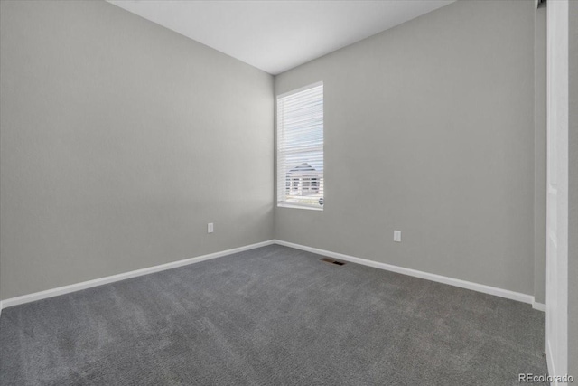 12862 Crane River Dr, Longmont, CO 80504 - unfurnished room featuring dark carpet and baseboards