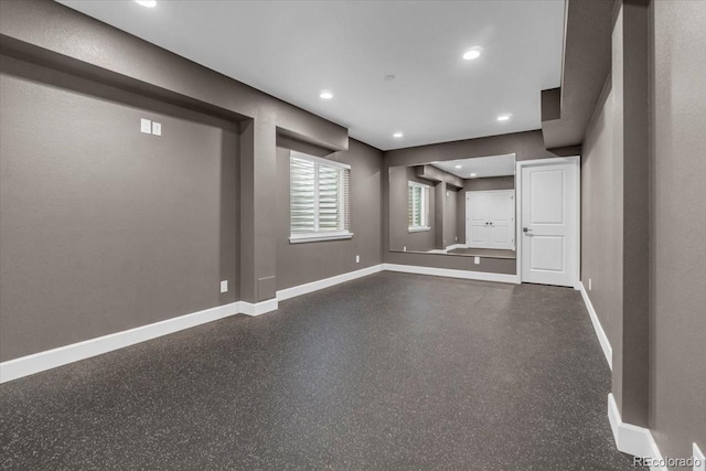 12862 Crane River Dr, Longmont, CO 80504 - unfurnished living room with baseboards and recessed lighting