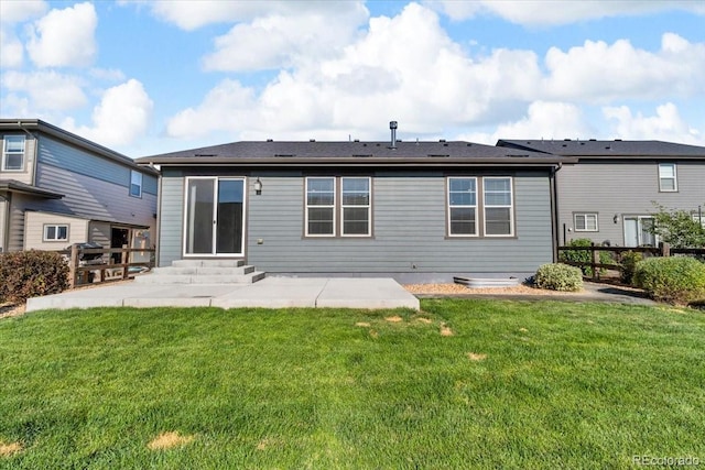 12862 Crane River Dr, Longmont, CO 80504 - back of property with a patio and entry steps