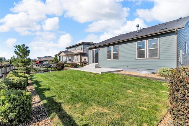 12862 Crane River Dr, Longmont, CO 80504 - back of property featuring a patio