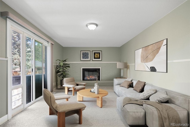 5455 E Iowa Ave, Denver, CO 80222 - carpeted living room with a glass covered fireplace