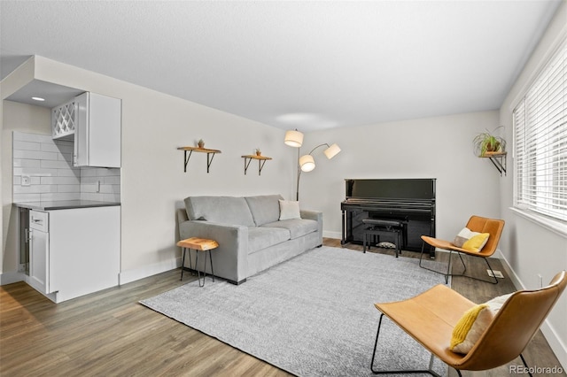 5455 E Iowa Ave, Denver, CO 80222 - living area with wood finished floors and baseboards