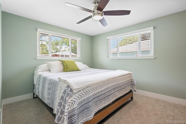 5455 E Iowa Ave, Denver, CO 80222 - bedroom featuring baseboards, carpet, and ceiling fan