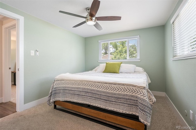 5455 E Iowa Ave, Denver, CO 80222 - bedroom featuring carpet flooring, a ceiling fan, and baseboards