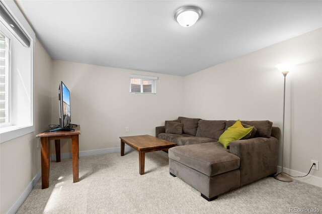 5455 E Iowa Ave, Denver, CO 80222 - living room with light colored carpet and baseboards