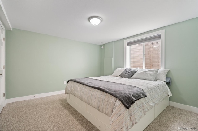 5455 E Iowa Ave, Denver, CO 80222 - bedroom with light carpet and baseboards